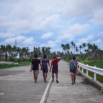 siargao locals walking down the road